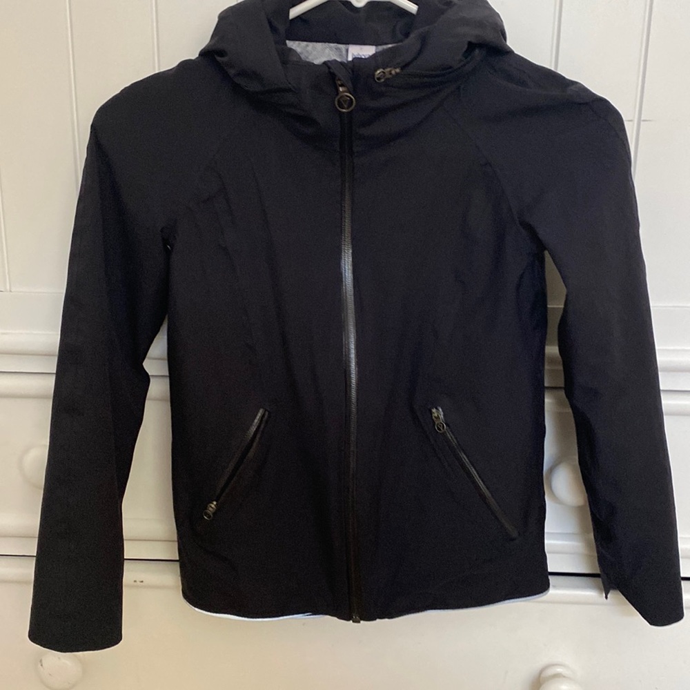 Ivivva black lined rain jacket size 7. NWOT